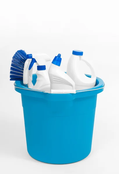 Cleaning supplies in blue bucket — Stock Photo, Image