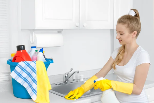 Woman with cleaning supplies — Stock Photo, Image