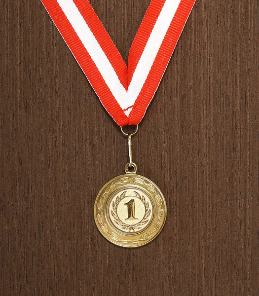 Médaille d'or fond en bois — Photo