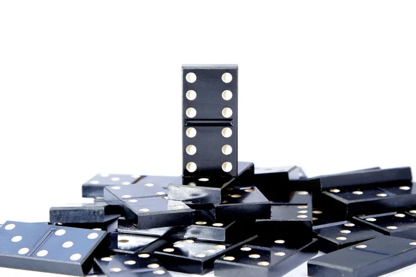 Last man standing one most valuable domino leader — Stock Photo, Image