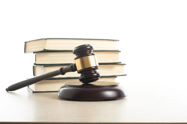 Law concept - Book with wooden judges gavel on table in a courtroom or enforcement office. — Stock Photo, Image