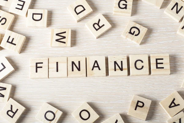 Metin ile ahşap bloklar: Finans