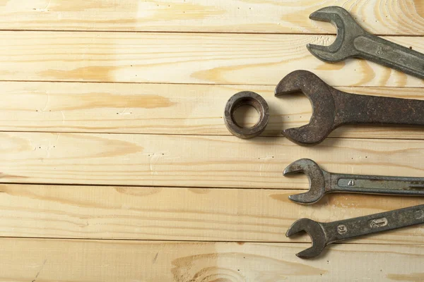 Set of construction tools. Wrench on wooden background — Stock Photo, Image