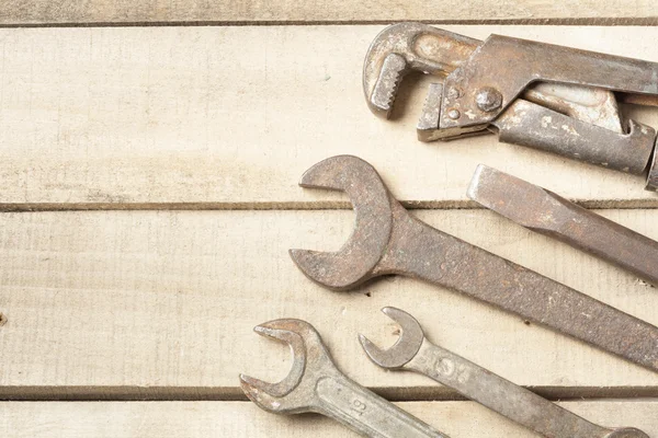 Set of construction tools. Wrench on wooden background — Stock Photo, Image