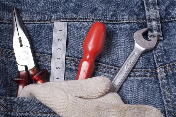 Attrezzi da costruzione in Blue Jeans Pocket . — Foto Stock
