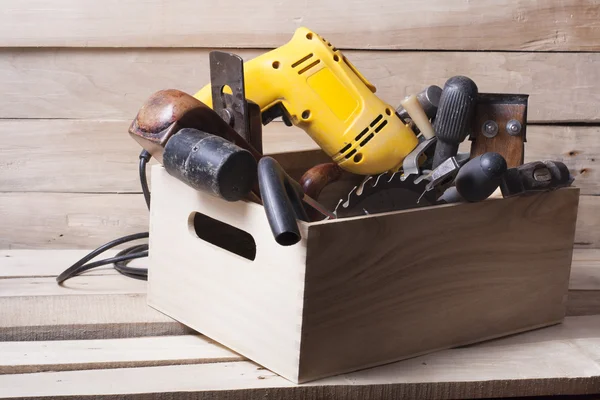 Construction tools on wooden table with sawdust. Joiner carpenter workplace top view. Copy space for text — Stock Photo, Image