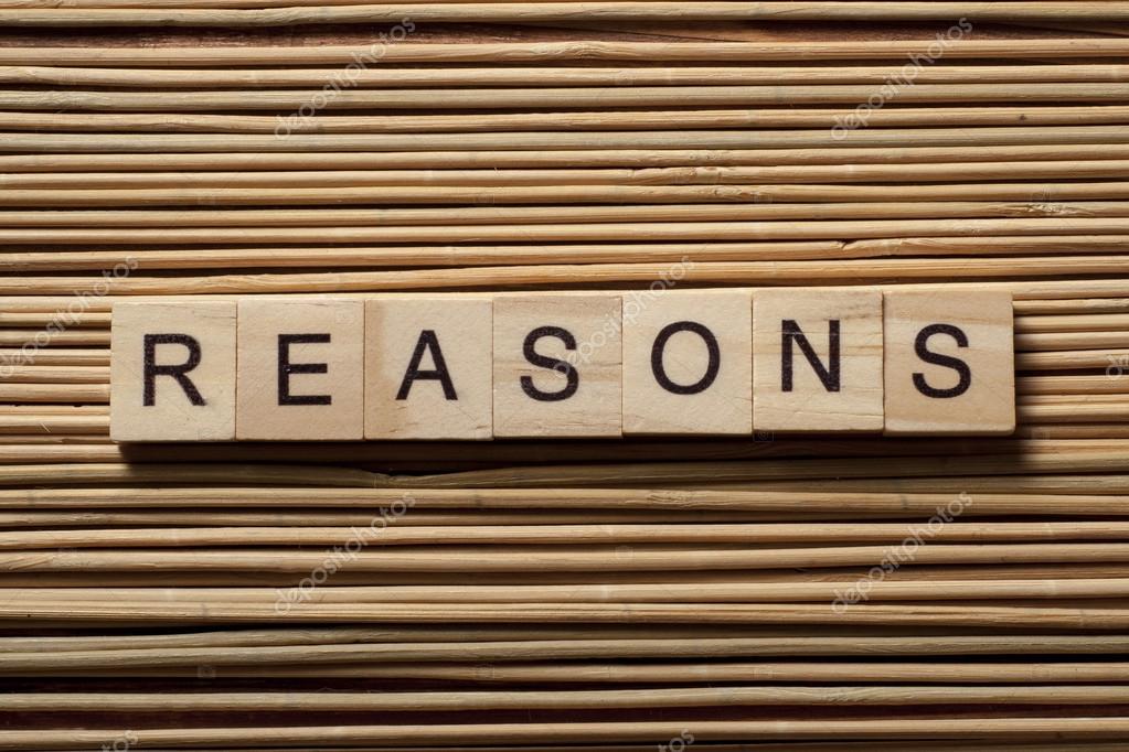 REASONS word written on wood abc block at wooden background Stock ...