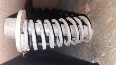 Tahtanın arka planında metal cıvata