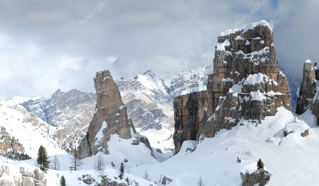 view of Cinque Torri (Five Towers group) in Winter Season in the Italian Dolomites near Cortina d'Ampezzo. Veneto, Italy.