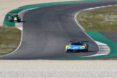 İtalya - 25 Mart 2021: Reiter Mühendislik Takımı 'ndan KTM X-BOW GTX (X26) Angermayr-Elghanayan-Felbermayr Jr. tarafından İtalya' daki Mugello Pisti 'nde yapılan 12h Hankook Yarışı sırasında kullanıldı..