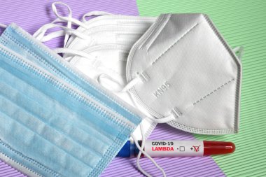 Virüsün saptanması için kan tüpü Covid-19 Lambda Varyantı koruma maskeleri ffp1 ve ffp2.