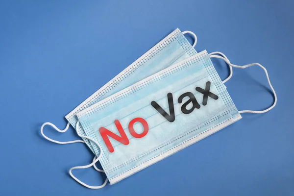 No Vax. Face protective mask against spread of Coronavirus or COVID-19 with written No Vax.