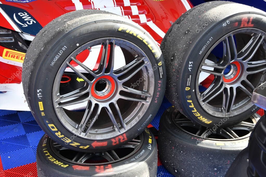 Scarperia; Italy - October 24th 2025: Alloy wheels with Pirelli tires of Ferrari 296 Challenge in the paddock. Ferrari World Finals 2025 at Mugello Circuit in Italy.