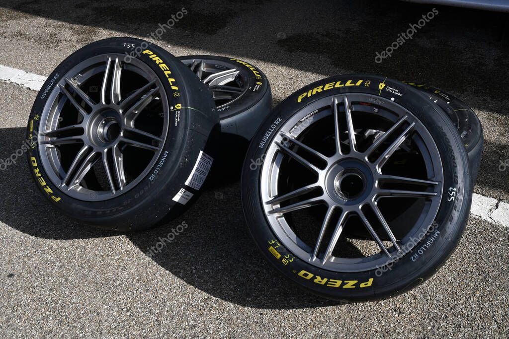 Scarperia; Italy - October 24th 2025: Alloy wheels with Pirelli tires of Ferrari 296 Challenge in the paddock. Ferrari World Finals 2025 at Mugello Circuit in Italy.