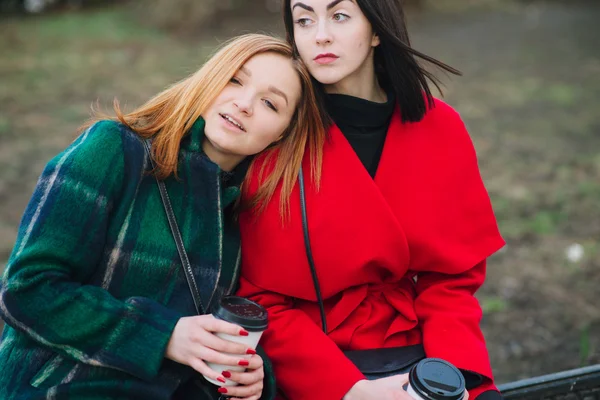 Two girls with gadget — Stock Photo, Image