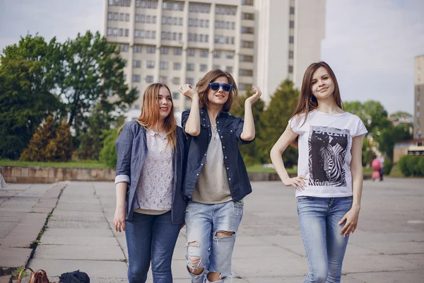 Three beautiful girls on walk — Stock Photo, Image