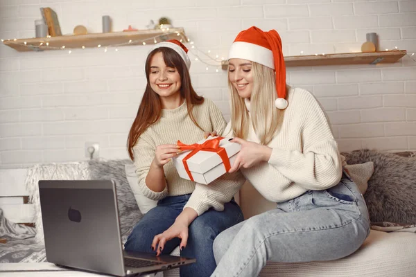 Women having fun with her friends video chat at home for Christmas — Stock Photo, Image