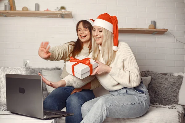 Women having fun with her friends video chat at home for Christmas — Stock Photo, Image