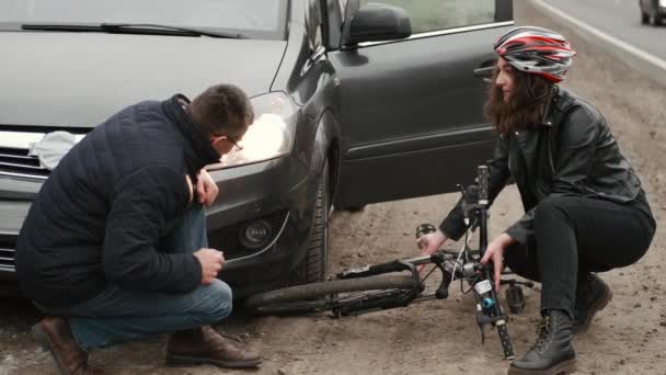 Man And Woman Arguing With Each Other After Car Bicycle Accident — Stock Video