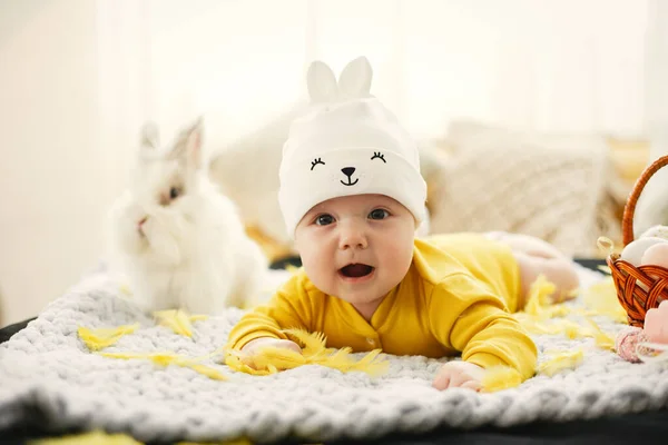 Toddler in yellow clothes before Easter — Stock Photo, Image