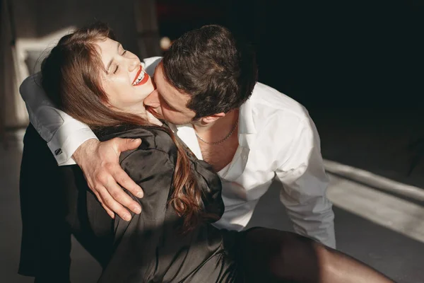 Portrait of young couple in love posing at studio — Stock Photo, Image