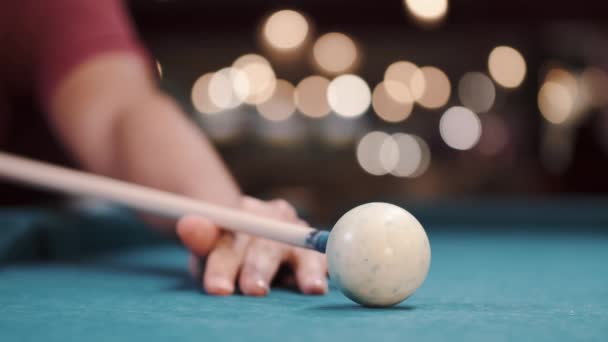 Young man playing snooker in a club closeup shot — Video