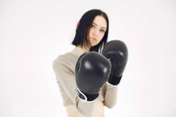 Girl with sports equipment on a white background — Stock Photo, Image