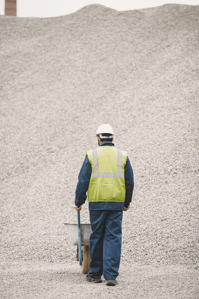 Civil engineer working outside with helmet