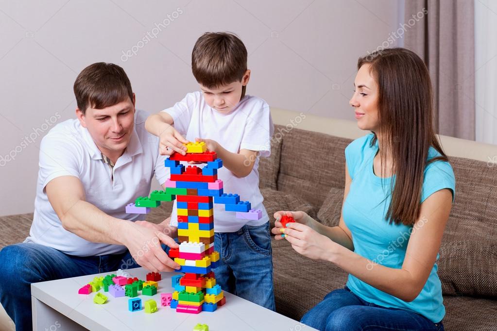 Family At The Table Playing Board Games Stock Photo Family At The Table Playing Board Games Stock Photo