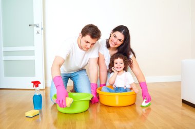 Üstten Görünüm mutlu bir aile. Anne, baba ve kızı yatan