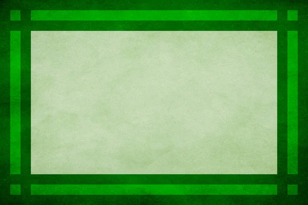 중앙에는 녹색의 기하학적 테두리 장식이 직물로 양피지 배경을 둘러싸고 녹색의 — 스톡 사진