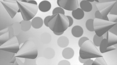 Birkaç geometrik koni ve dairesel şekiller gradyan gri arkaplan üzerinde yüzerek yumuşak gölgeleme ve soyut derinliğe sahip minimalist üç boyutlu bir bileşim oluştururlar..