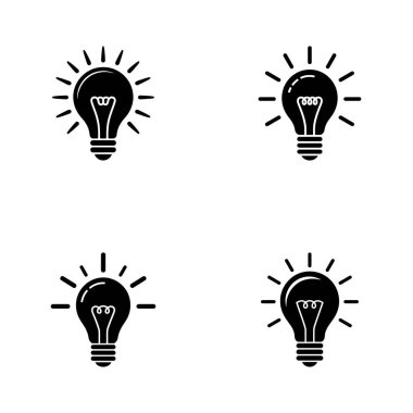 Four distinct black and white light bulb icons are presented on a white background, each radiating lines to represent ideas and illumination, conveying creativity and innovation.