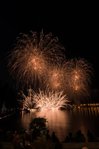 Fireworks on garda lake — Stock Photo, Image