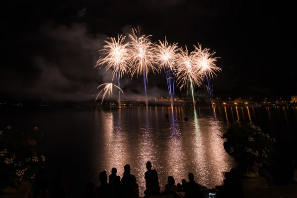 Fireworks on garda lake — Stock Photo, Image