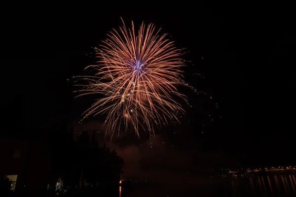 Fireworks on garda lake — Stock Photo, Image