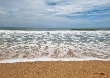 The perspective of sea wave on the sand beach.