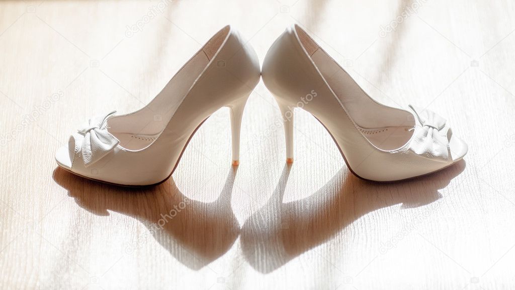Bride's high heel wedding shoes. Marriage concept