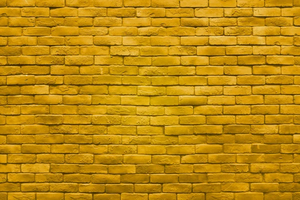 Pared de ladrillo de oro amarillo textura color fondo . — Foto de Stock