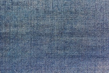 Detaylı dokuma tekstil yüzey desenli mavi kot kumaş dokusu.