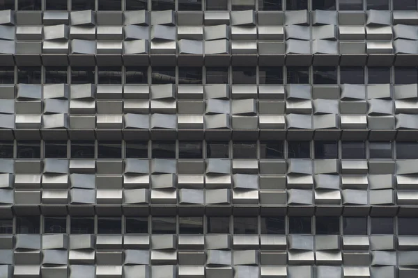 Šedá Fasáda Moderní Kancelářské Budovy Řadou Oken Spoustou Malých Betonových — Stock fotografie