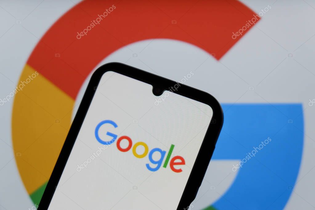 Bandung, Indonesia - October 9, 2025: In this photo illustration, Google logo is displayed on a smartphone.