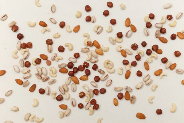 Nüsse auf Baumwolle Leinwand Textur — Stockfoto