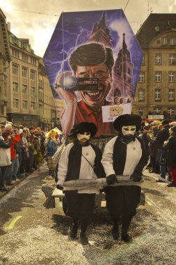 BASEL, SWitzerland, 11 Mart 2019. İsviçre, Basel 'deki geleneksel karnaval maskeleri geçit töreni..