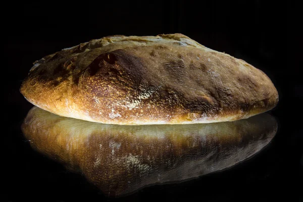 Pão caseiro no fundo — Fotografia de Stock