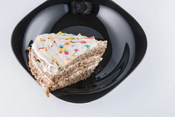Вкусный торт на тарелке — стоковое фото