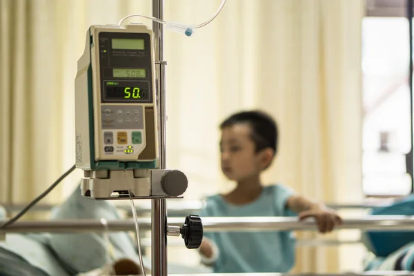 A sick Little boy in hospital bed. — Stock Photo, Image