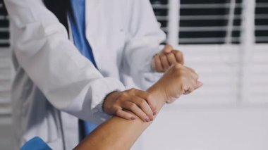 close up. doctor with a stethoscope and his patient in a hospital
