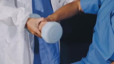 doctor and nurse holding a stethoscope