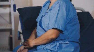 young patient in hospital ward.